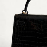 Bolsa Hermès Kelly 25 Crocodile Niloticus Shiny Noir com Ferragens Gold