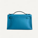 Bolsa Hermès Kelly Pochette Zanzibar com Ferragens Palladium