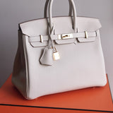 Bolsa Hermès Birkin 25 Togo Craie com Ferragens Gold