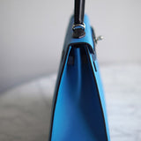 Bolsa Hermès Kelly 25 Epsom Bleu Zanzibar | Bleu Nuit com Ferragens Palladium