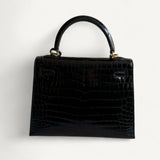Bolsa Hermès Kelly 25 Crocodile Niloticus Shiny Noir com Ferragens Gold
