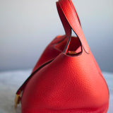 Bolsa Hermès Picotin 18 Clemence Orange com Ferragens Gold