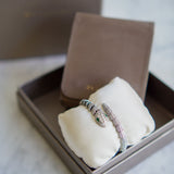 Pulseira Bvlgari Serpenti em Ouro Branco 18K cravejada com Pavê de Diamantes e dois Olhos de Esmeralda