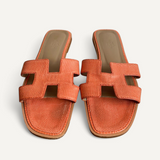 Sandália Rasteira Hermès Oran Orange Joey em Couro Lizard