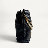 Bolsa Chanel 22 Mini em Couro Calfskin Preta com Ferragens Douradas